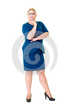 Thoughtful businesswoman in blue dress