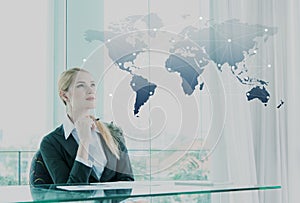 Thoughtful businesswoman in office, business globalization concept