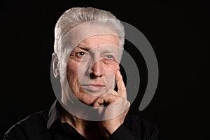 Thoughtful elder man