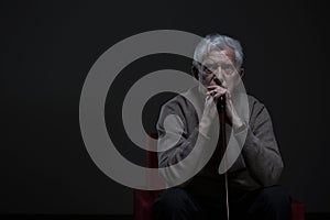 Thoughtful elder man