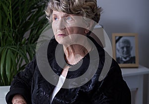 Thoughtful elderly widow