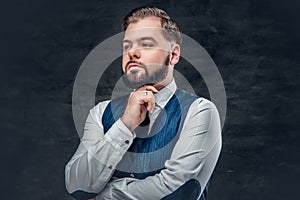 Thoughtful and elegant business man wearing waistcoat.