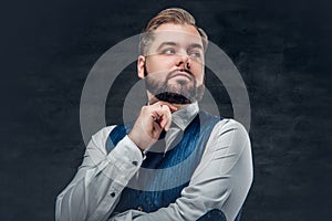 Thoughtful and elegant business man wearing waistcoat.