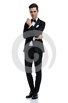 Thoughtful elegant man wearing tuxedo