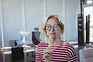 Thoughtful entrepreneur wearing eyeglasses