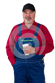 Thoughtful farmer or worker holding a coffee