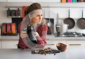 Thoughtful female food photographer