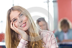 Thoughtful female student in classroom