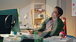 Thoughtful freelancer staring computer screen at office closeup. Man pondering