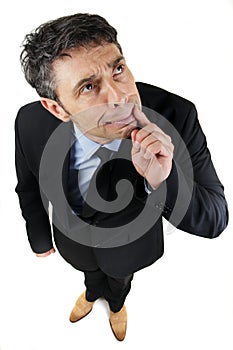 Thoughtful frowning businessman photo