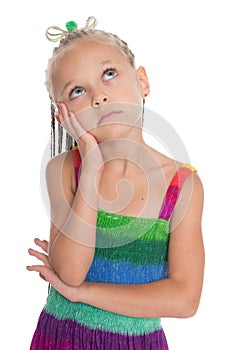 Thoughtful girl looking up