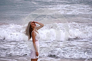 Thoughtful girl near the ocean