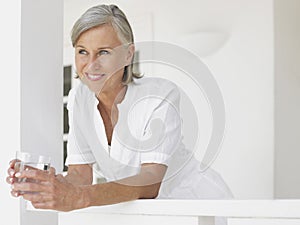 Thoughtful Happy Middle Aged Woman Looking Away