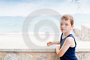 Thoughtful little boy on summer vacations