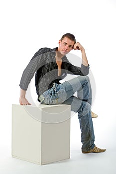 The thoughtful man on a cube