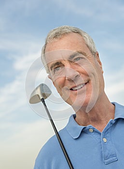 Thoughtful Man With Golf Club Against Sky