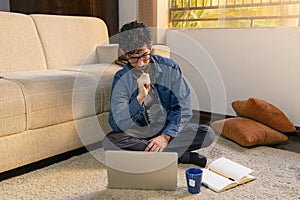 Thoughtful man trying to solve work problems. Working from home concept