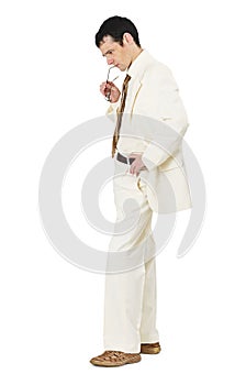 Thoughtful man in white business suit