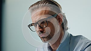 Thoughtful man working computer office closeup. Businessman hands typing laptop