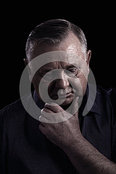 Thoughtful mature man portrait