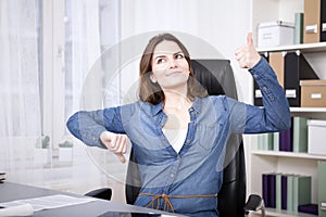 Thoughtful Office Woman Showing Thumbs Up and Down