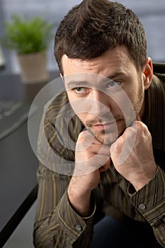 Thoughtful office worker photo