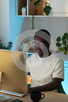 Thoughtful web developer work on computer, programmer trying to find solution for bug in app code