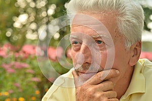 Thoughtful senior man in park