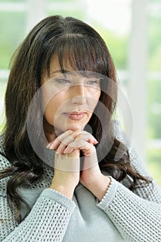 Thoughtful Senior woman