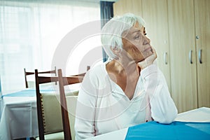 Thoughtful senior woman