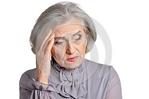 thoughtful senior woman isolated on white background