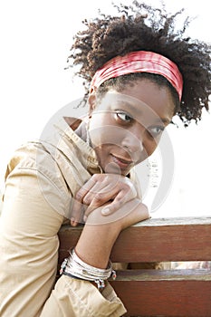 Thoughtful woman on bench.