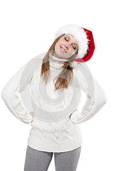 Thoughtful woman in a Santa hat isolated on white background