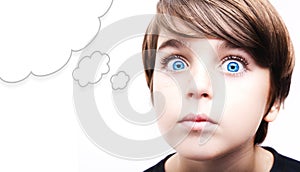 Young boy with an empty thought bubble