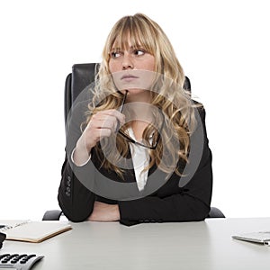 Thoughtful young business manageress photo