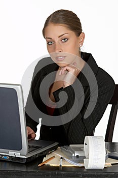 Thoughtful Young Business Woman with Laptop