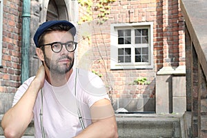 Thoughtful young man looking away