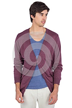 Thoughtful young man looking away