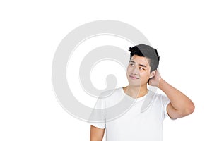 Thoughtful young man looking away