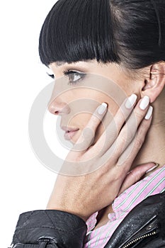 Thoughtful Young Woman Concentrating with Hand on Her Face