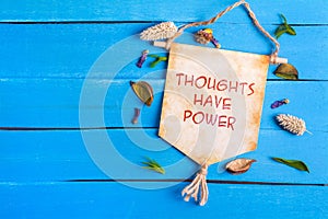 Thoughts have power text on Paper Scroll