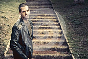 Thoughts, male anxiety. Model handsome man near steps.