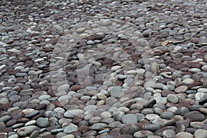 Thousands of black and grey stones