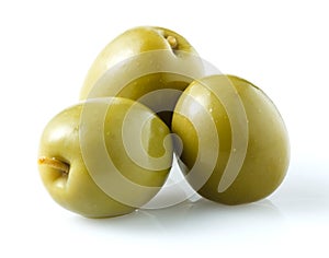 Thre green olives isolated on white