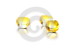 Thre yellow gelatin pills