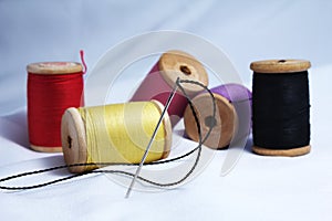 Thread bobbins and needle