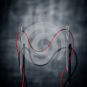 Thread are cast on the background enhancing the composition s