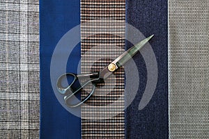 Thread fabric wool sewing man cage blue choice design atelier tailor many different things color scissors