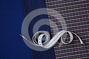 Thread fabric wool sewing man cage blue choice design atelier tailor many different things color tape-measure