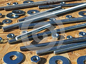 Threaded metal rods and metal nuts